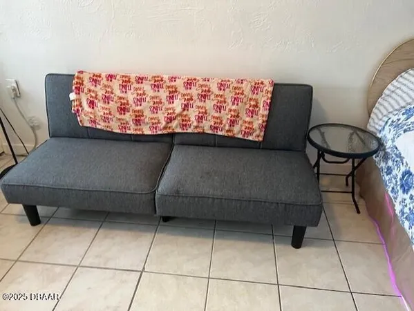 a living room with a couch and a coffee table