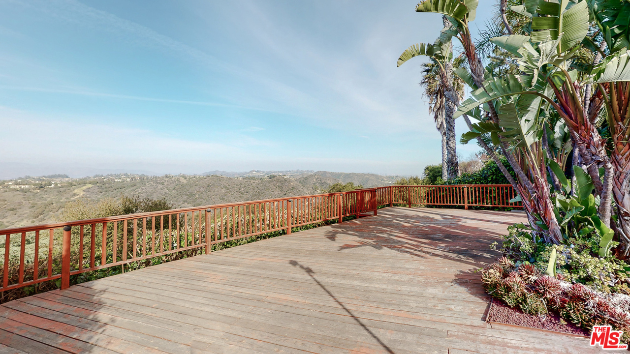 2254 Stradella Road Los Angeles, CA 90077 - Photo 25 of 29 a view of balcony with ocean view