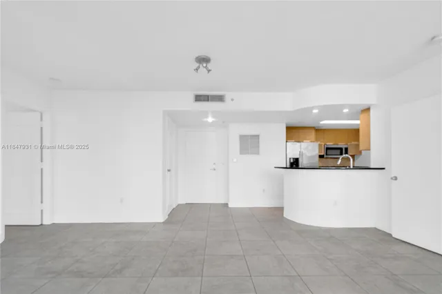 $450,000 | 1881 79th Street Causeway, Unit 404, North Bay Village, FL 33141