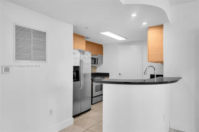 $450,000 | 1881 79th Street Causeway, Unit 404, North Bay Village, FL 33141