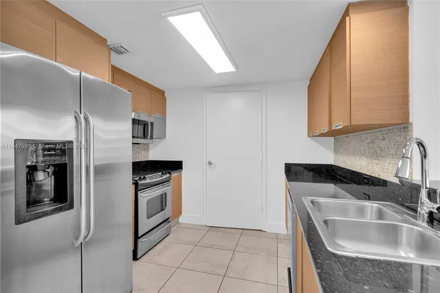 $450,000 | 1881 79th Street Causeway, Unit 404, North Bay Village, FL 33141