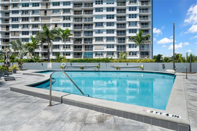 $450,000 | 1881 79th Street Causeway, Unit 404, North Bay Village, FL 33141