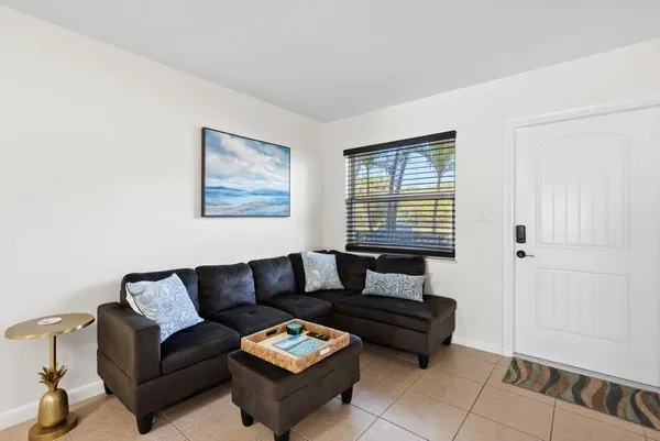 a living room with furniture and a couch