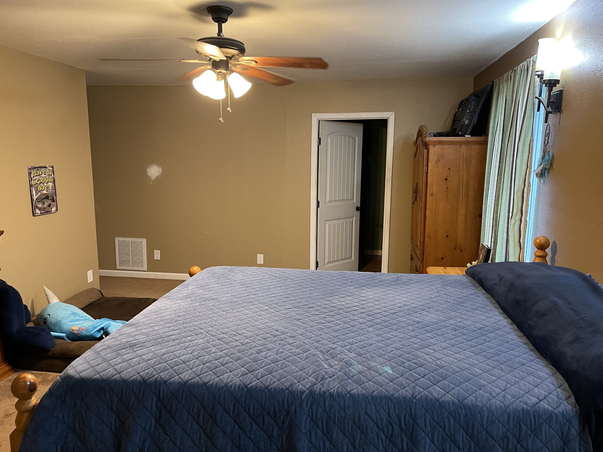 2053 Dog Branch Road Prospect, TN 38477 - Photo 12 of 25 a bedroom with a bed dresser and a window