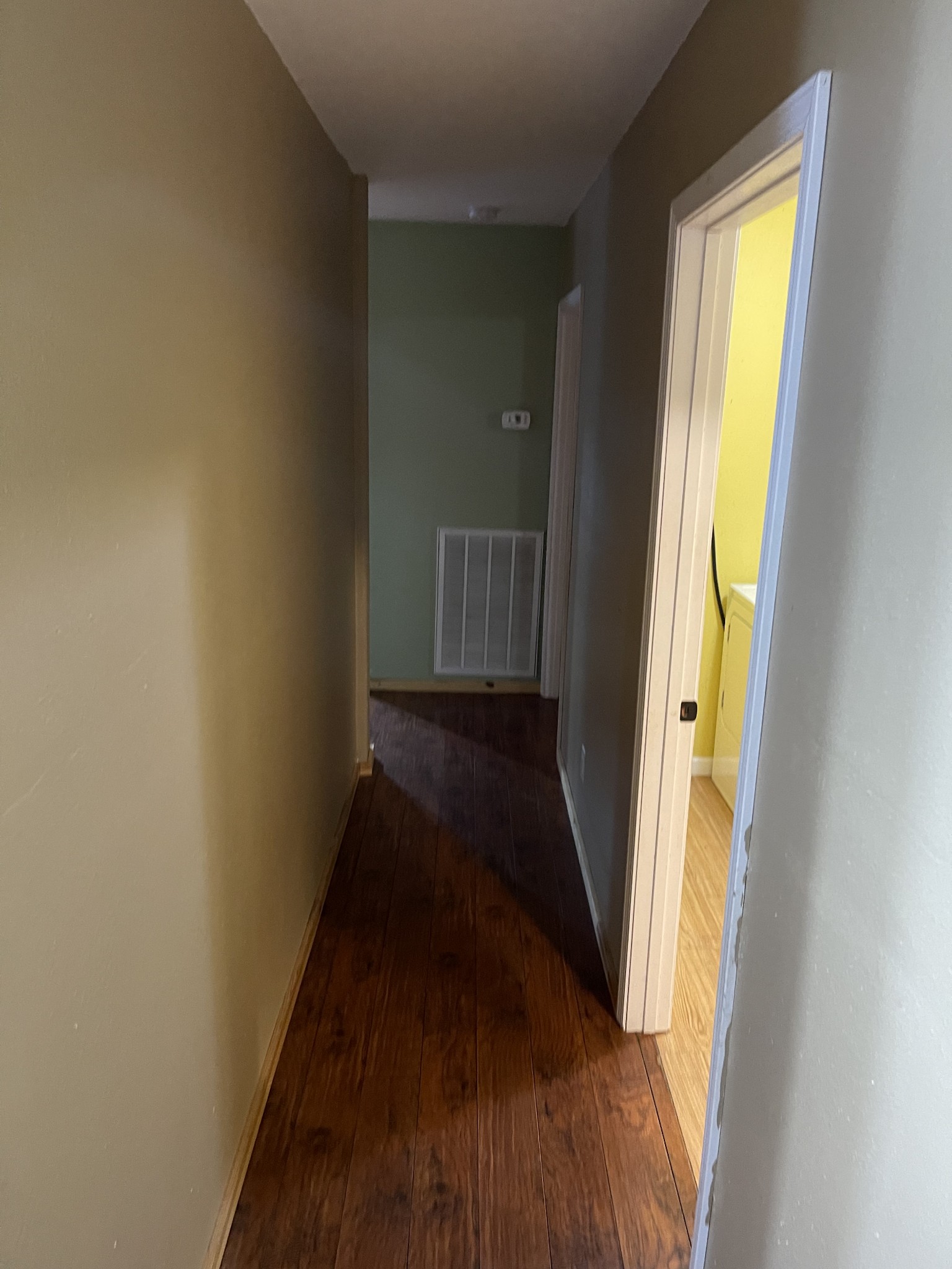 2053 Dog Branch Road Prospect, TN 38477 - Photo 17 of 25 a view of a hallway with wooden floor and a bathroom