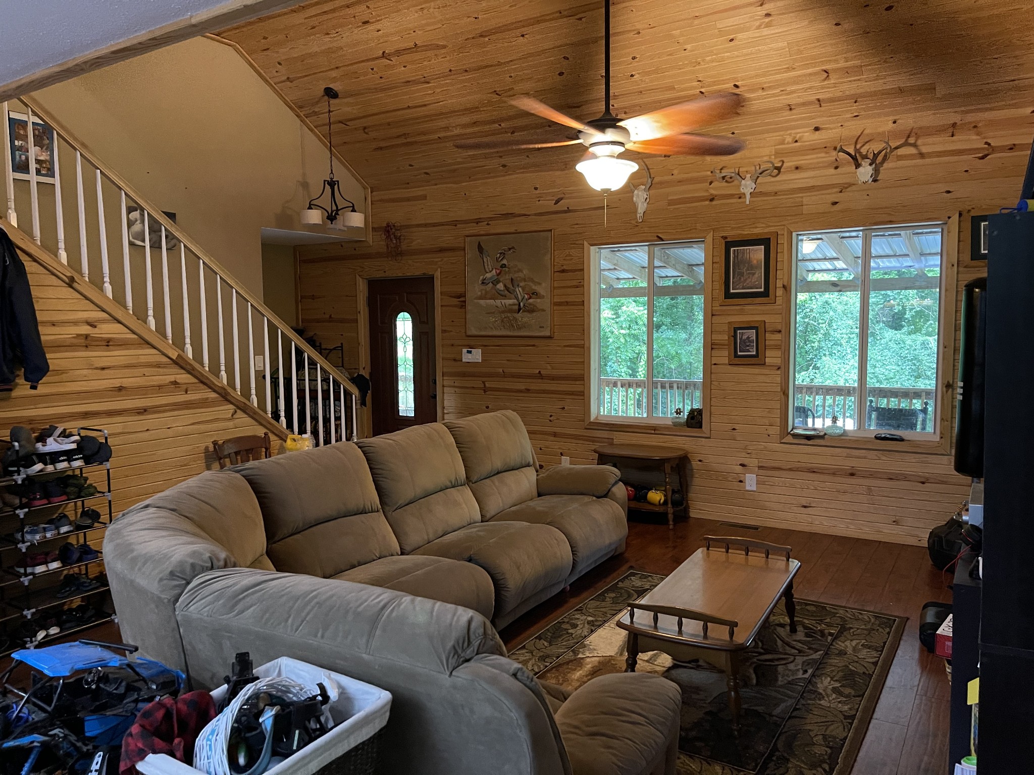 2053 Dog Branch Road Prospect, TN 38477 - Photo 4 of 25 a living room with furniture a chandelier and a flat screen tv