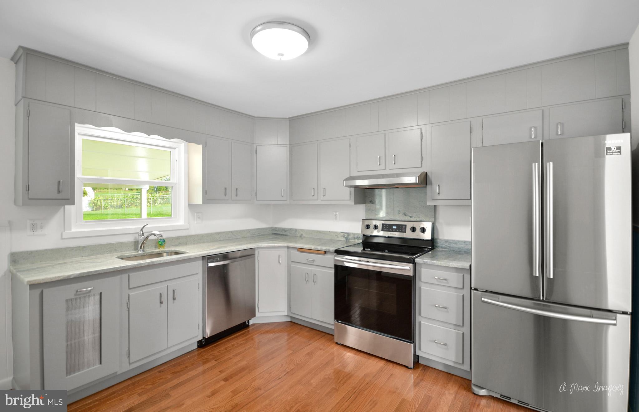 5902 Quinn Road Frederick, MD 21701 - Photo 3 of 37 Updated kitchen w/gleaming hardwoods