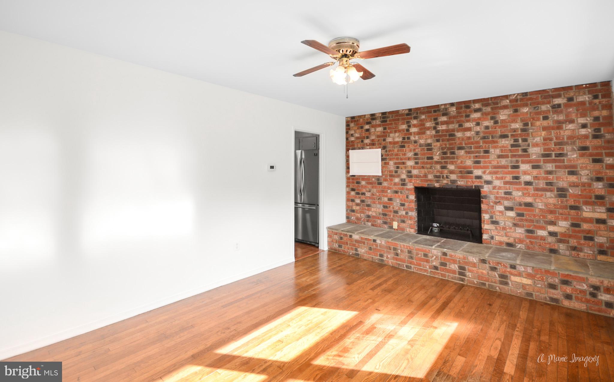 5902 Quinn Road Frederick, MD 21701 - Photo 7 of 37 Family Room w/door to kitchen