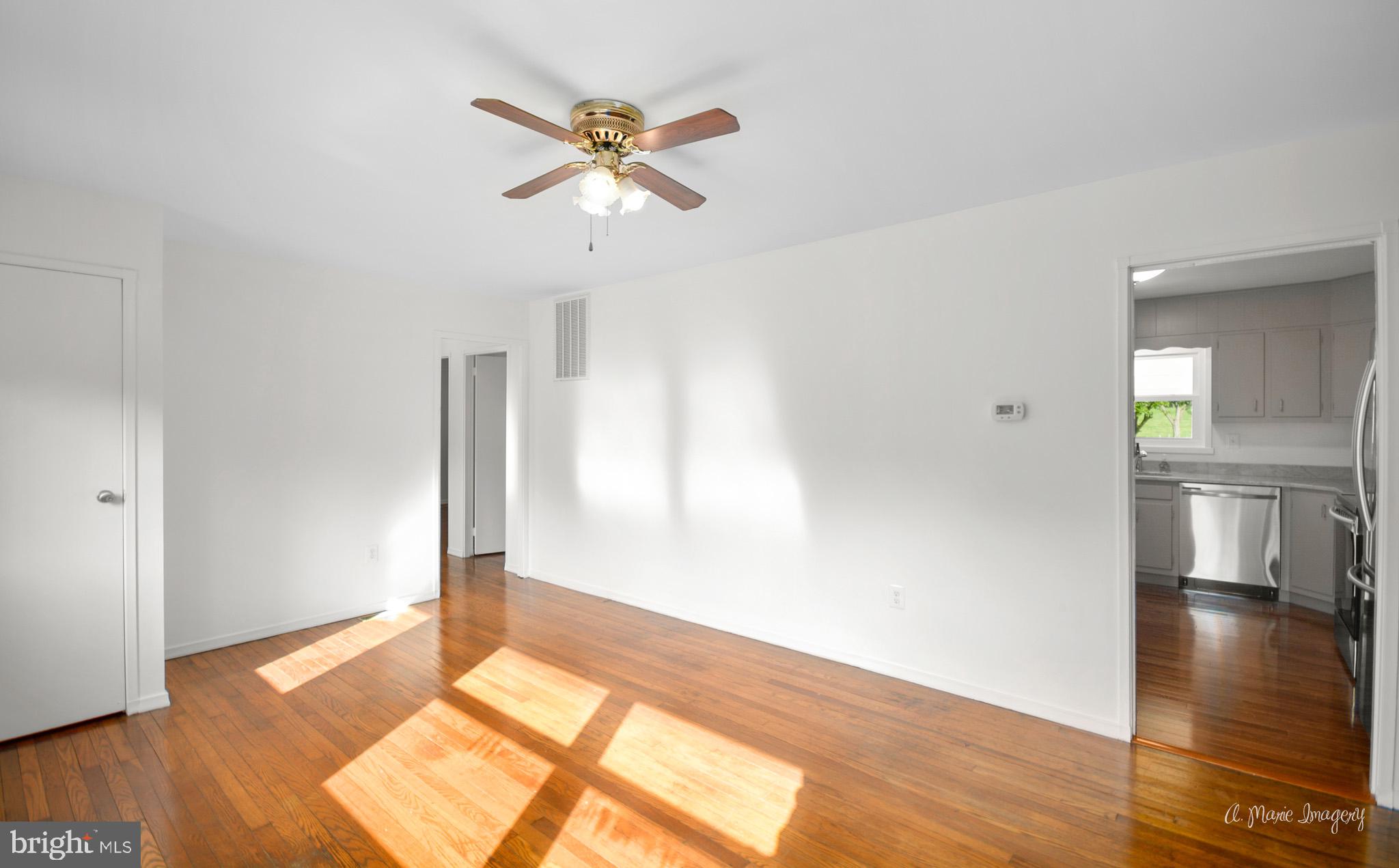 5902 Quinn Road Frederick, MD 21701 - Photo 10 of 37 Family room opens to kitchen and hall