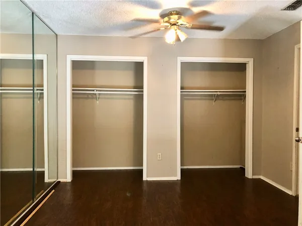 a view of a room with racks on the wall
