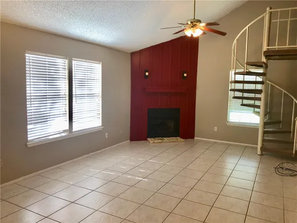 a view of empty room with windows