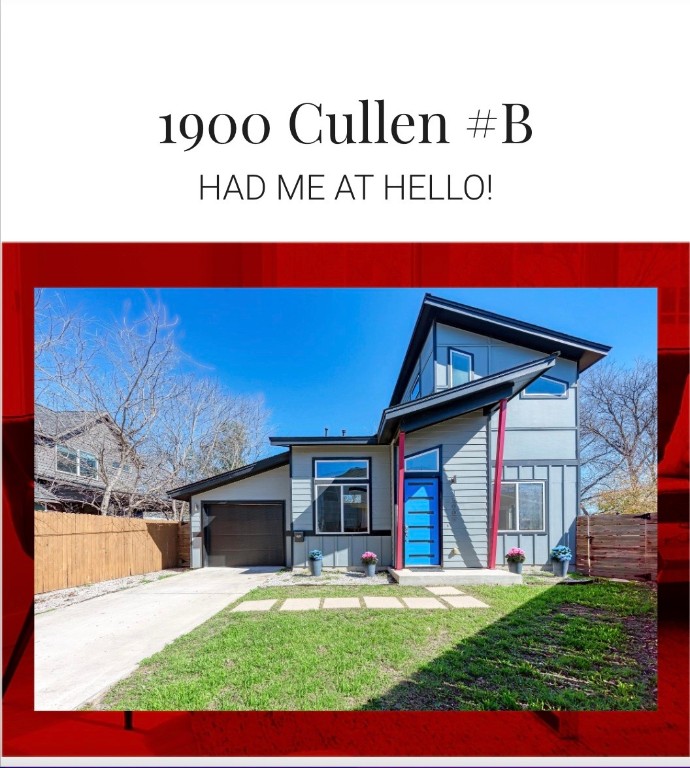 a view of a house with a yard and garage