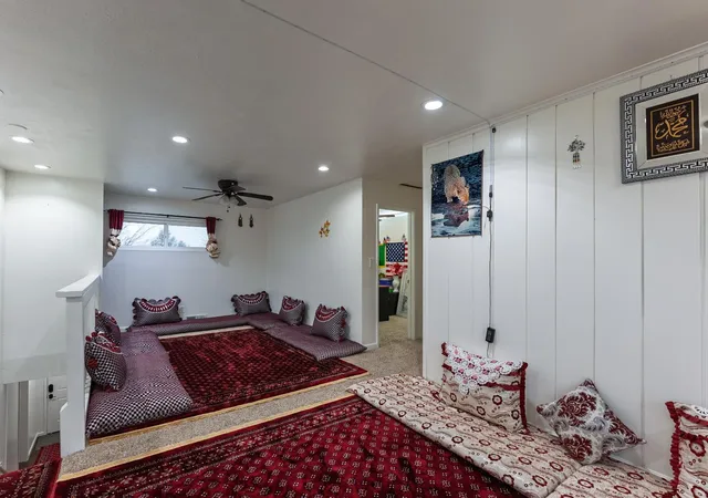 a bathroom with a toilet a sink and shower