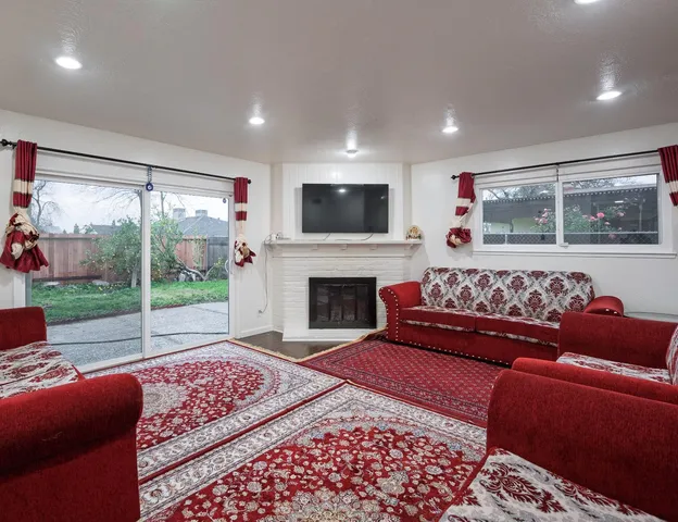a kitchen with cabinets and a stove top oven
