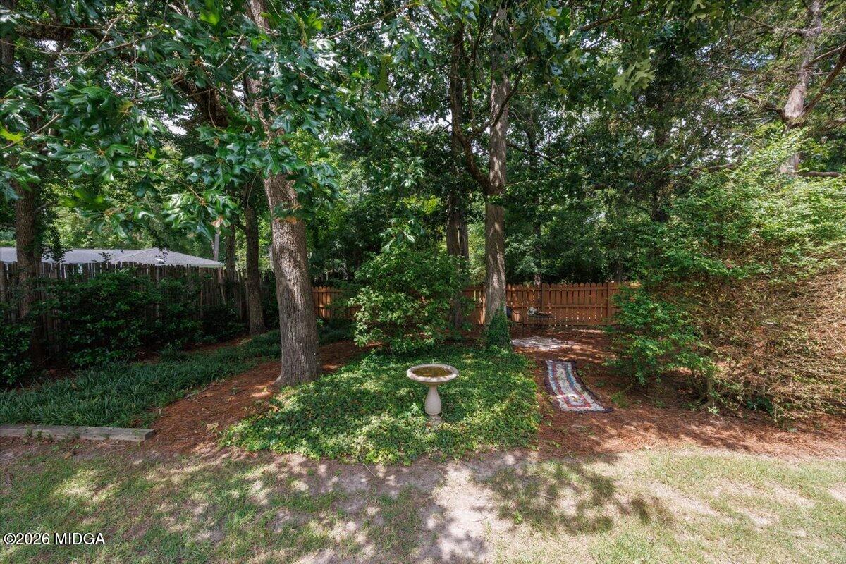 210 Oberon Place Macon, GA 31210 - Photo 28 of 31 a backyard of a house with lots of green space