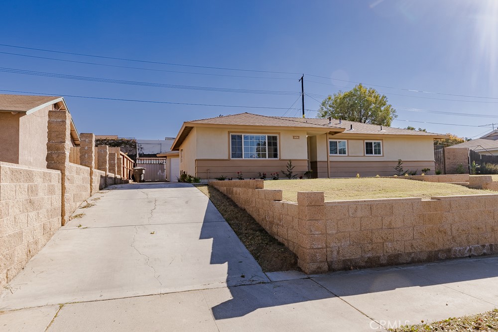 8476 Colorado Avenue Riverside, CA 92504 - Photo 1 of 1 a front view of a house with a yard