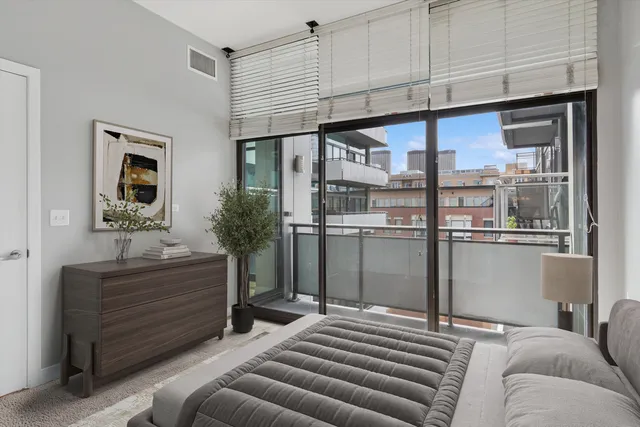 a city street lined with tall buildings