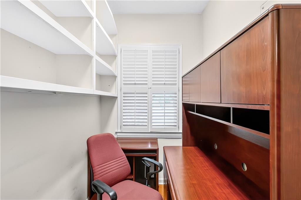 2197 Spring Walk Court Atlanta, GA 30341 - Photo 13 of 31 a chair and a table in a room