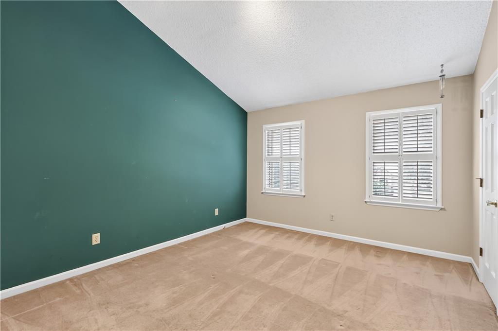 2197 Spring Walk Court Atlanta, GA 30341 - Photo 16 of 31 a view of an empty room with a window