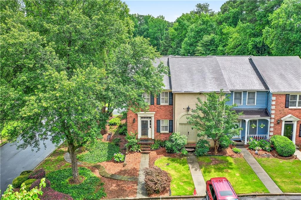2197 Spring Walk Court Atlanta, GA 30341 - Photo 29 of 31 a aerial view of a house with yard and green space