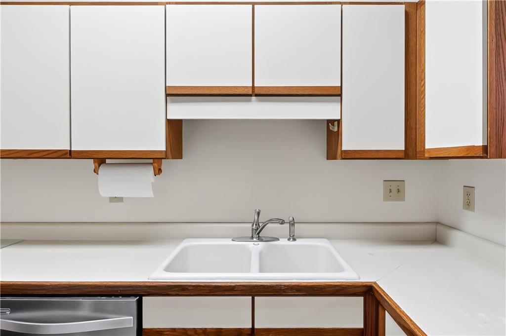 2197 Spring Walk Court Atlanta, GA 30341 - Photo 7 of 31 a bathroom with a sink and a mirror