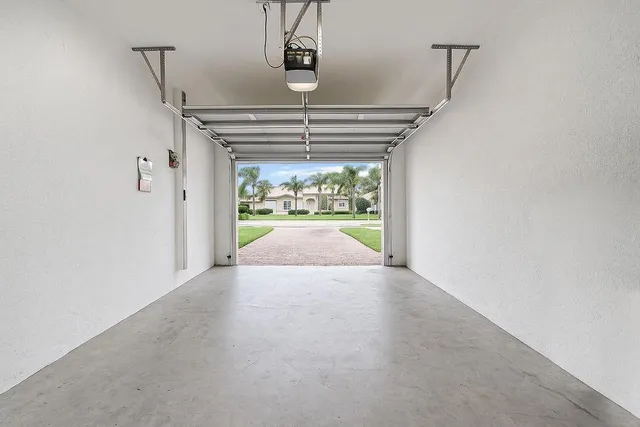 a view of a swimming pool with a yard