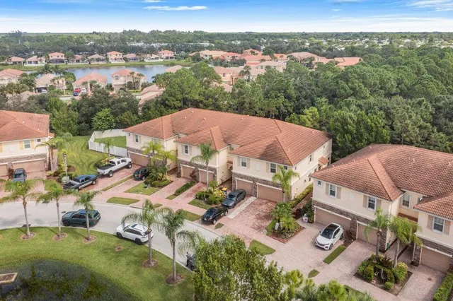 an aerial view of residential building and lake view