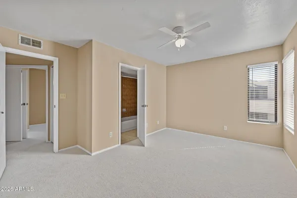a kitchen with stainless steel appliances a microwave a sink and a refrigerator