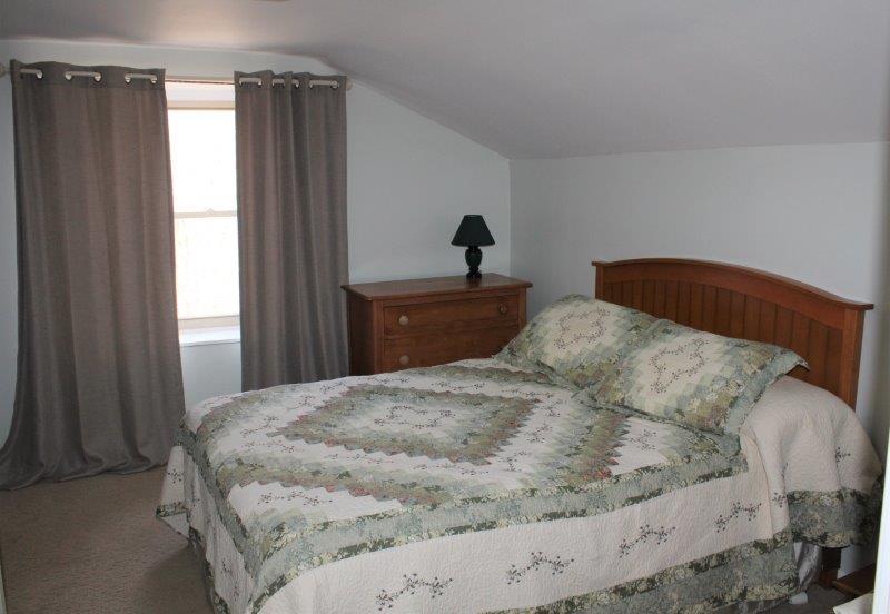 16930 Crosby Road Morrison, IL 61270 - Photo 24 of 32 a bedroom with a bed and a window