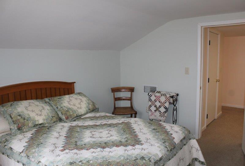 16930 Crosby Road Morrison, IL 61270 - Photo 26 of 32 a bedroom with a bed and a dresser