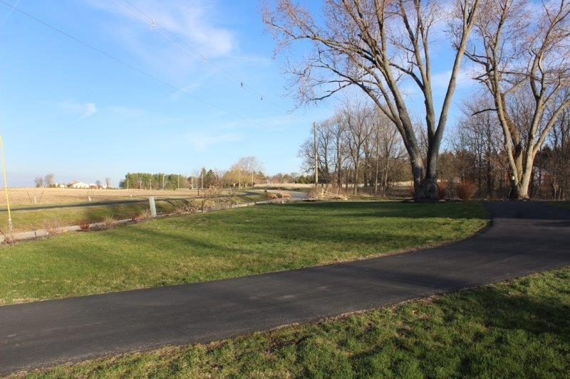 16930 Crosby Road Morrison, IL 61270 - Photo 8 of 32 a view of a golf course with a house