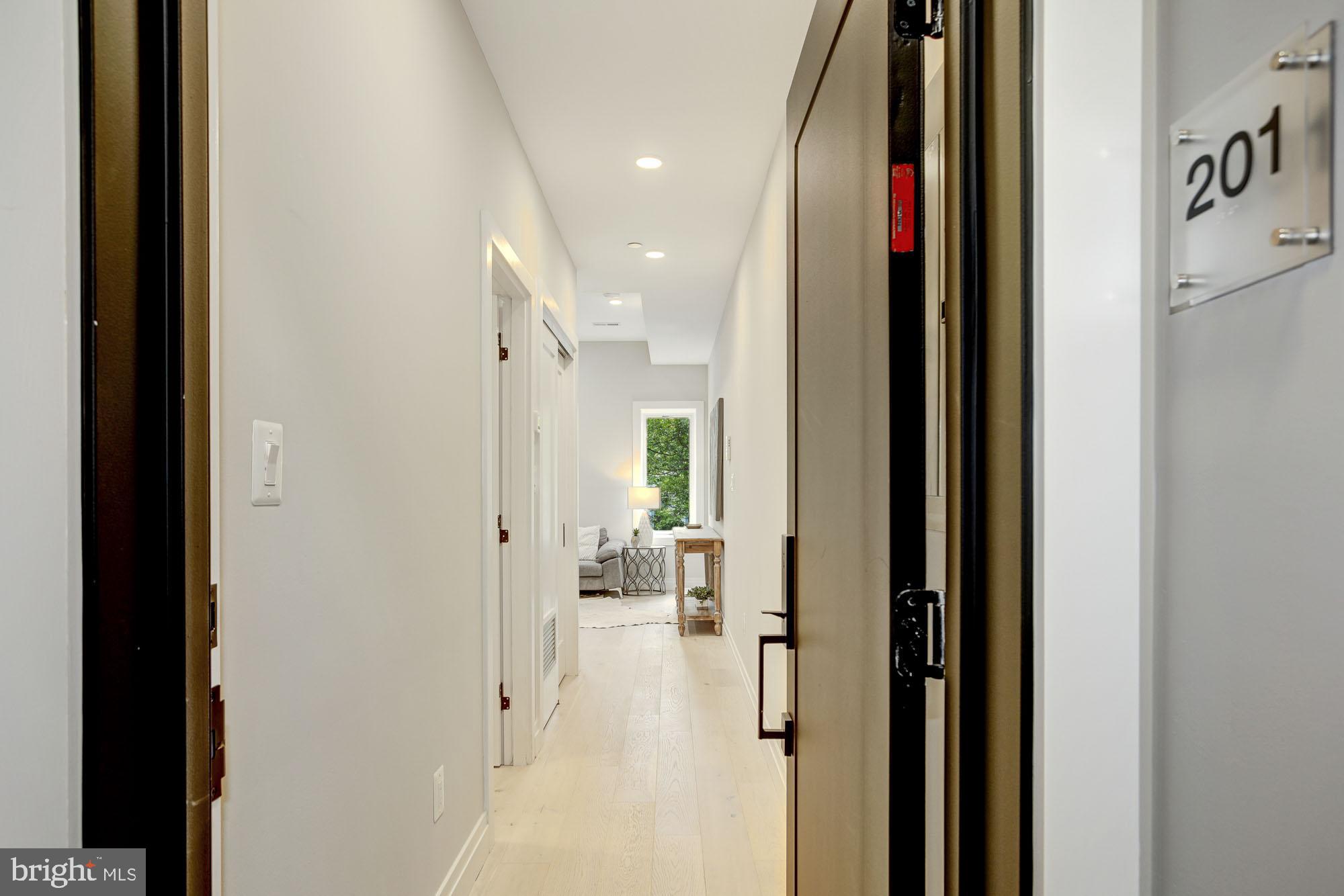 2301 Ontario Road Northwest, Unit 201 Washington, DC 20009 - Photo 2 of 13 and unit 201. Hallway perfect for art wall!