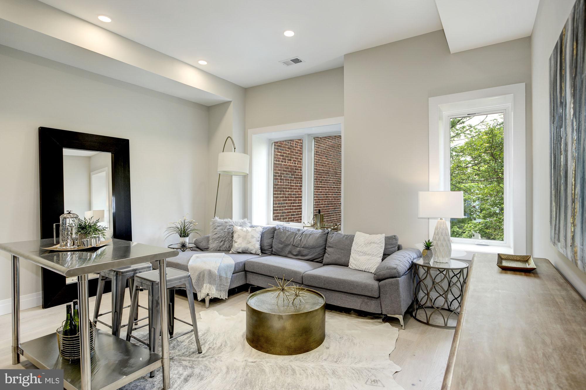 2301 Ontario Road Northwest, Unit 201 Washington, DC 20009 - Photo 3 of 13 Street facing with gorgeous tree-lined views
