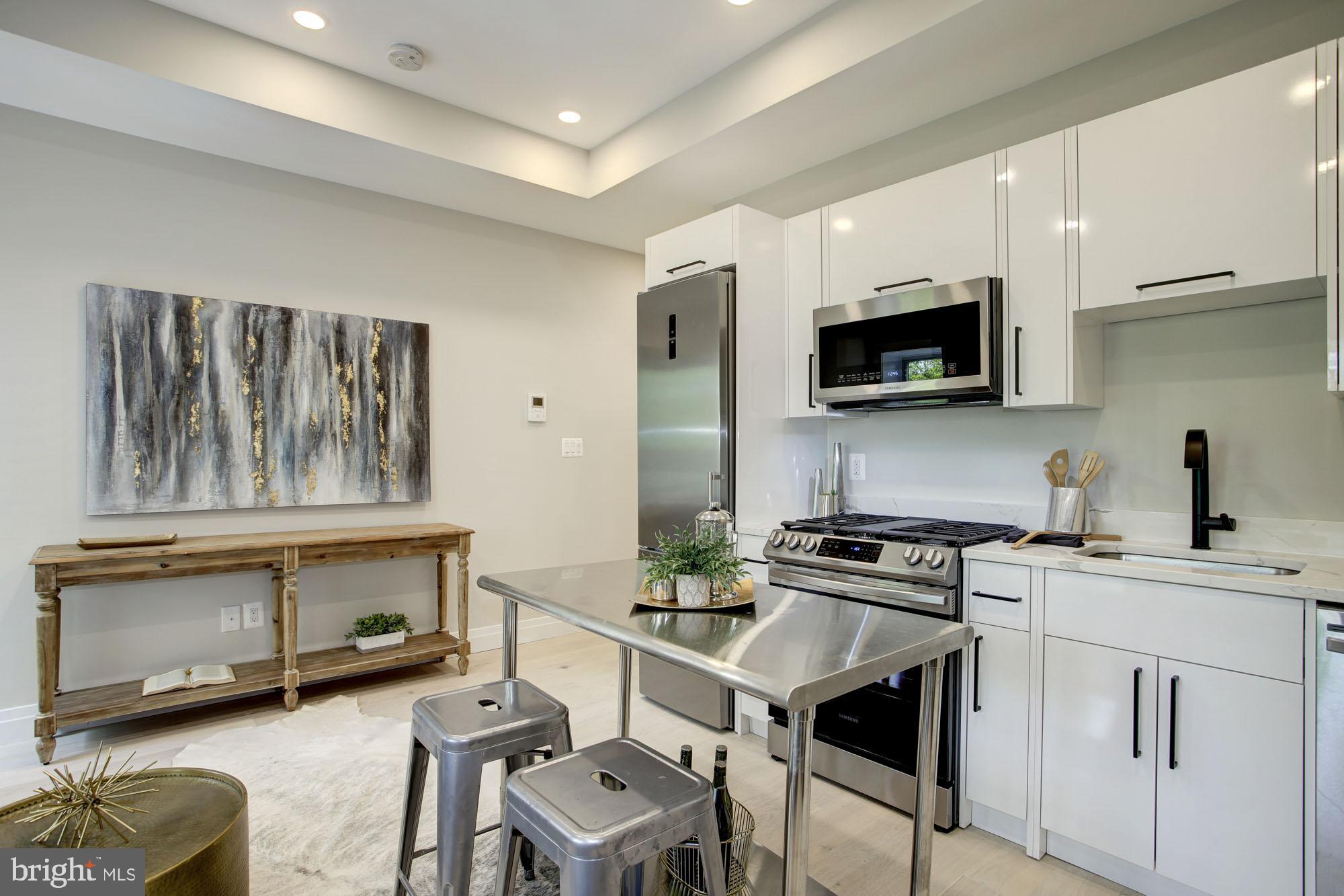 2301 Ontario Road Northwest, Unit 201 Washington, DC 20009 - Photo 4 of 13 Modern efficient kitchen
