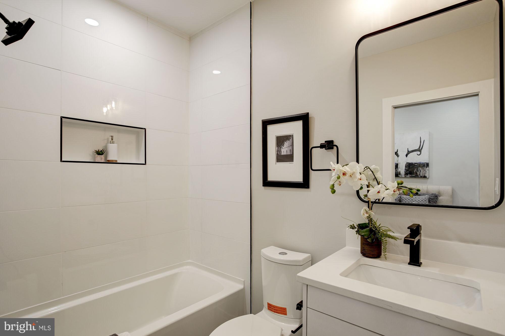 2301 Ontario Road Northwest, Unit 201 Washington, DC 20009 - Photo 8 of 13 Chic full bath