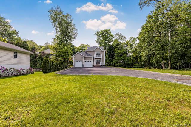 1 Kewanee Road New Rochelle, NY 10804 - Photo 31 of 36 a house view with swimming pool in front of it