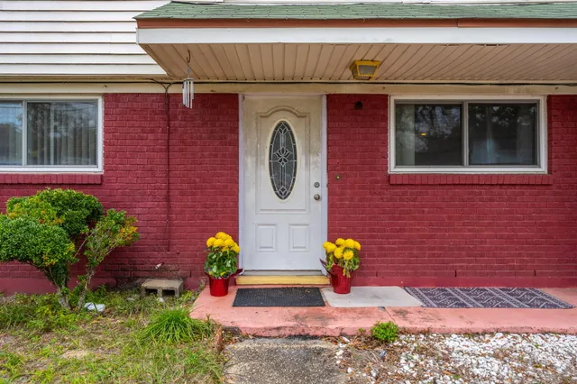 a house with trees in front of it