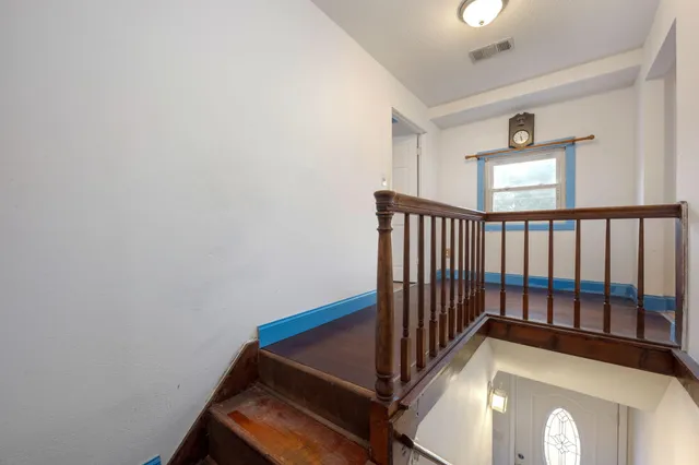 a view of a hallway with entryway