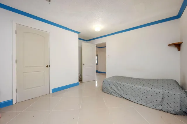 a view of bedroom and bathroom