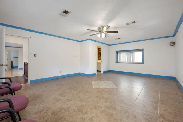 a view of livingroom and hardwood floor