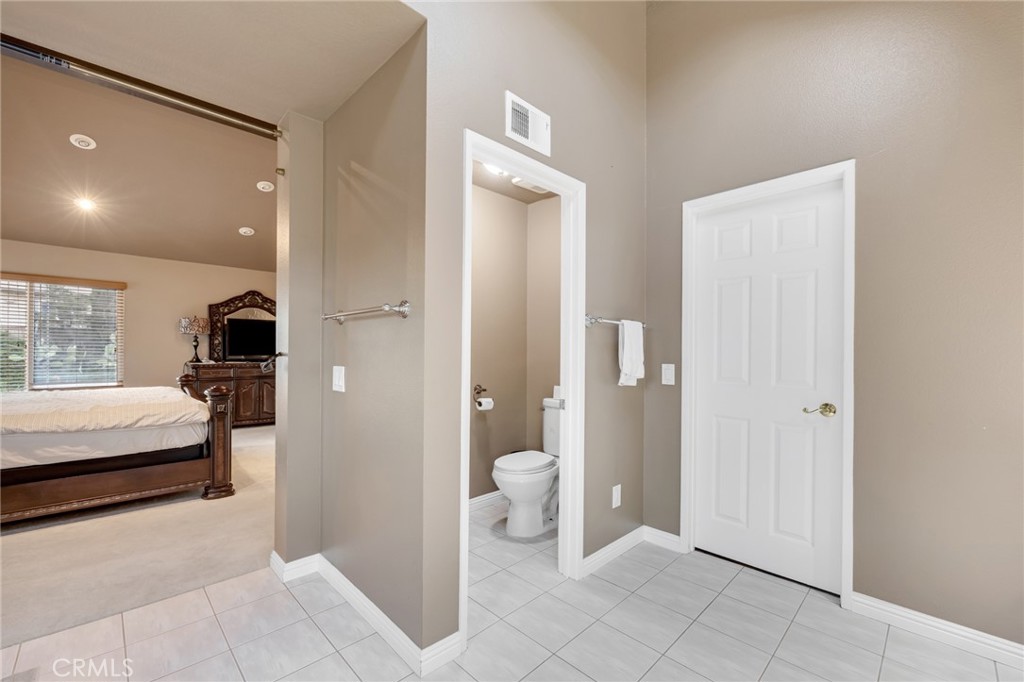 2611 Rudy Street Rowland Heights, CA 91748 - Photo 22 of 37 a bathroom with a toilet and a shower