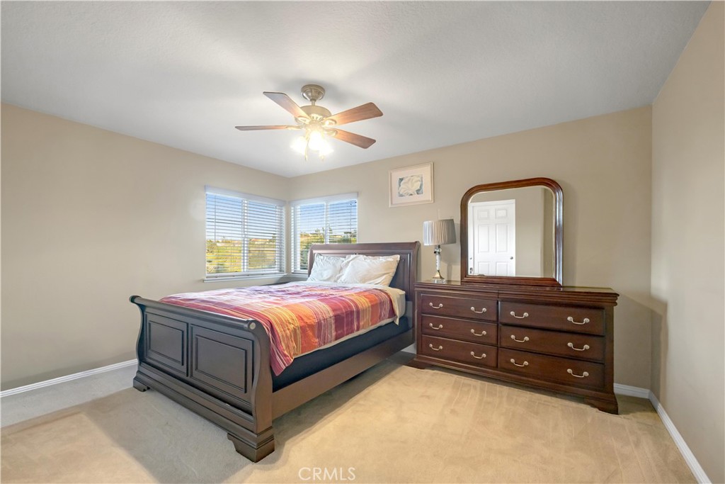 2611 Rudy Street Rowland Heights, CA 91748 - Photo 28 of 37 a bedroom with a bed and a chandelier