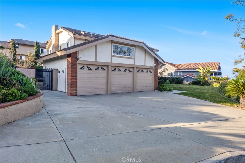 2611 Rudy Street Rowland Heights, CA 91748 - Photo 3 of 37 a view of a house with a yard