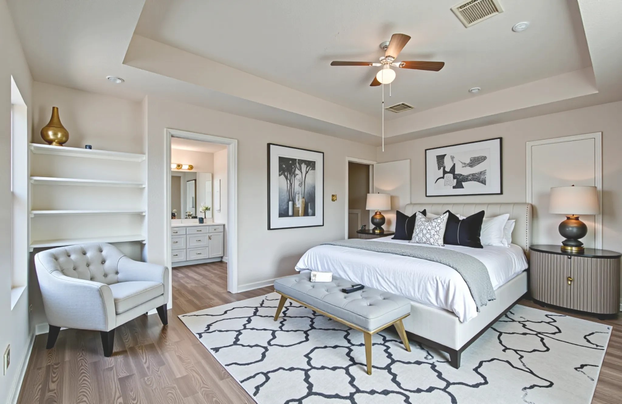 18518 Alemarble Oak Street Cypress, TX 77429 - Photo 13 of 17 a spacious bedroom with a bed and a chandelier