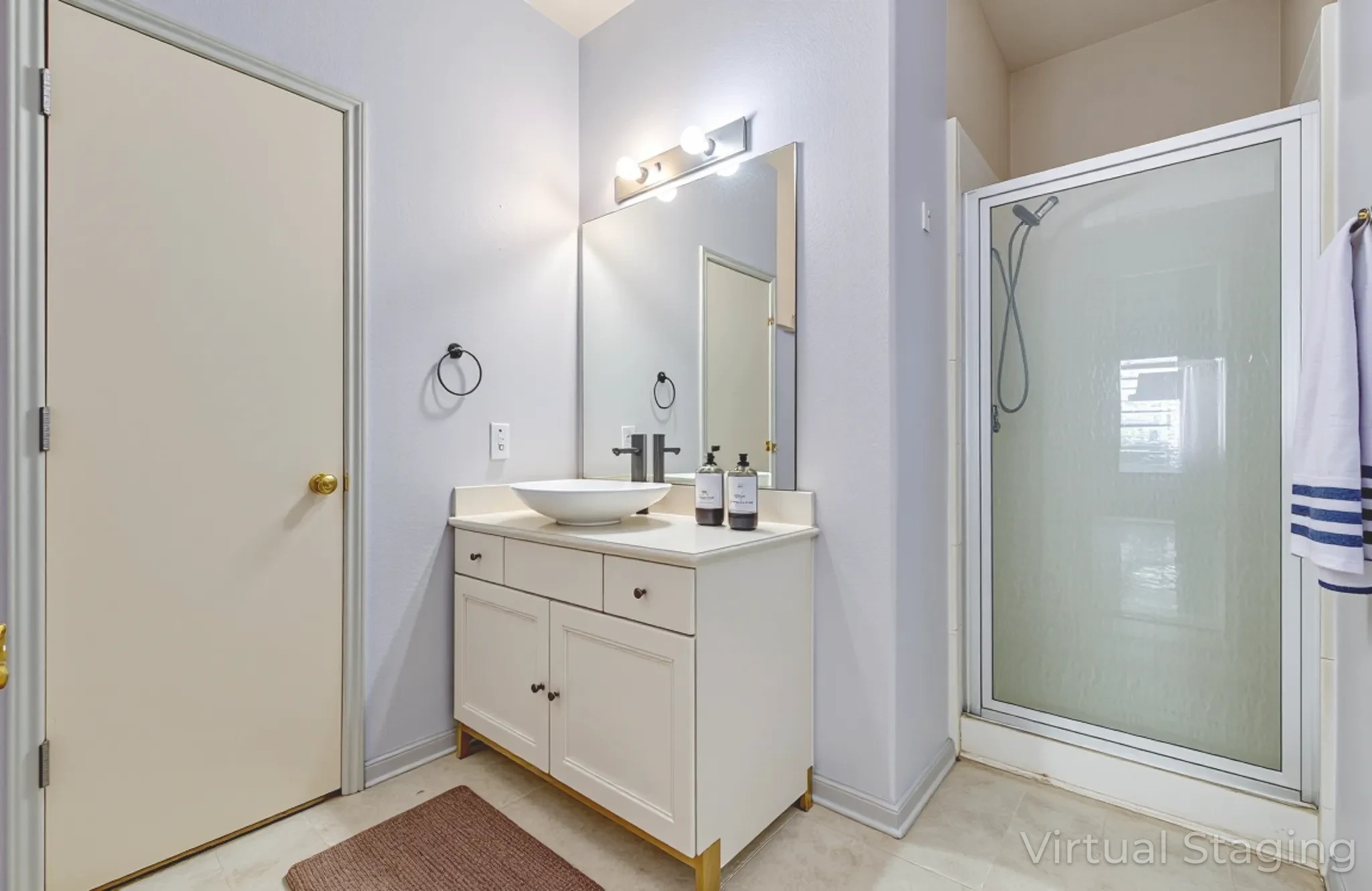 18518 Alemarble Oak Street Cypress, TX 77429 - Photo 9 of 17 a bathroom with a double vanity sink mirror and shower