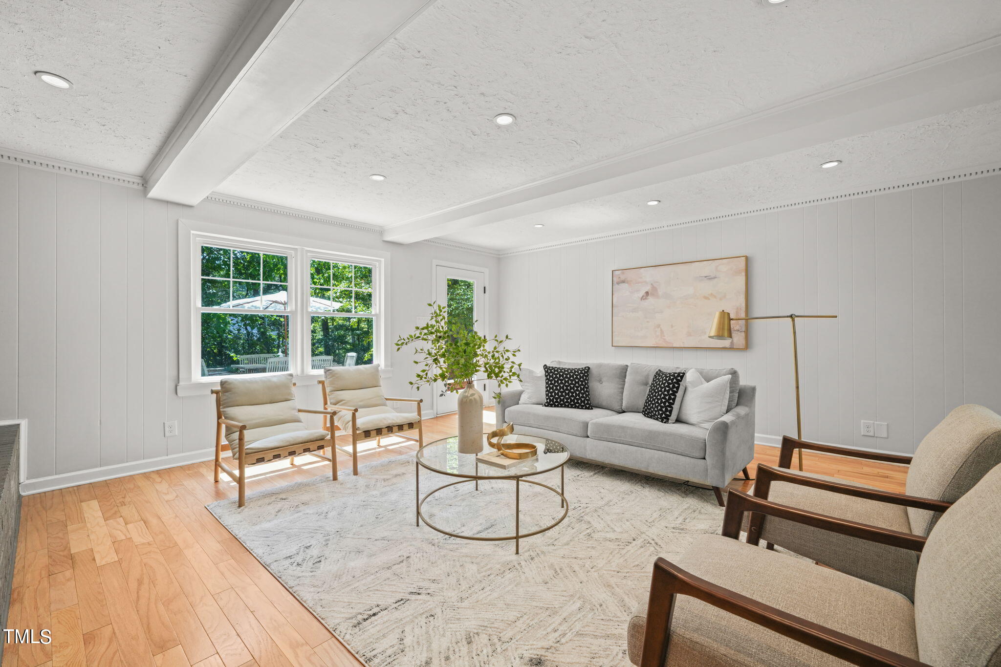 4604 Timberly Drive Durham, NC 27707 - Photo 18 of 60 a living room with furniture and a large window
