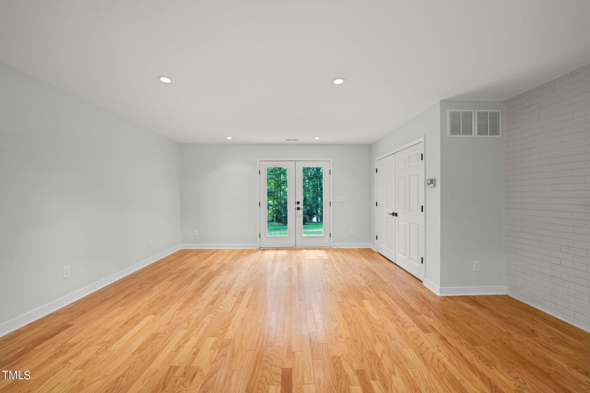 4604 Timberly Drive Durham, NC 27707 - Photo 22 of 60 a view of room with window and hardwood floor