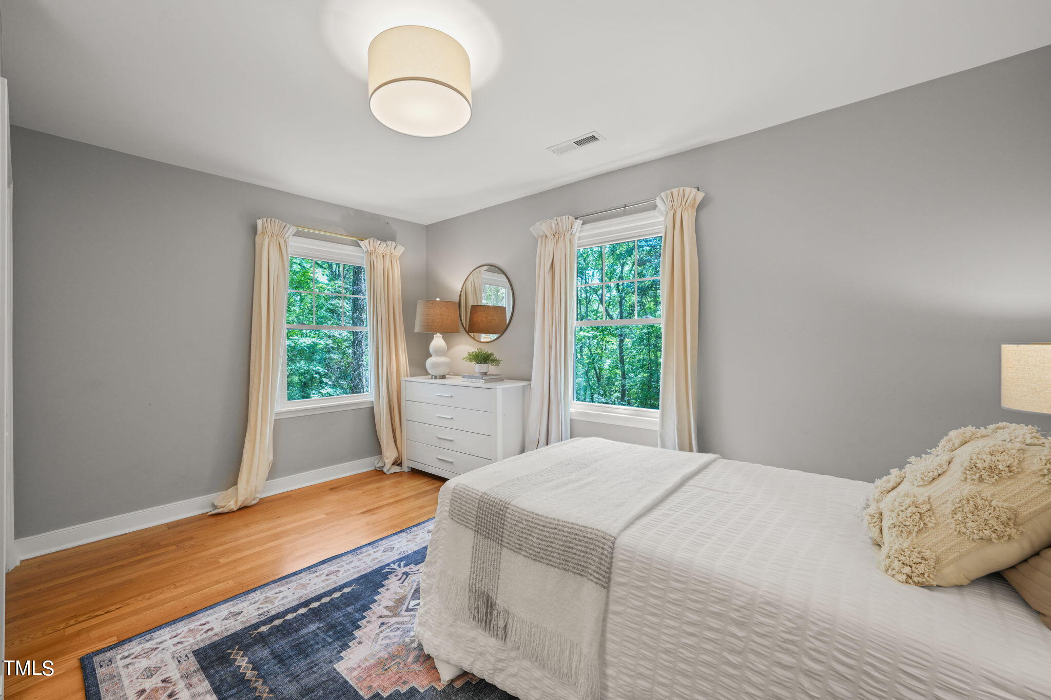 4604 Timberly Drive Durham, NC 27707 - Photo 30 of 60 a bedroom with a bed and window