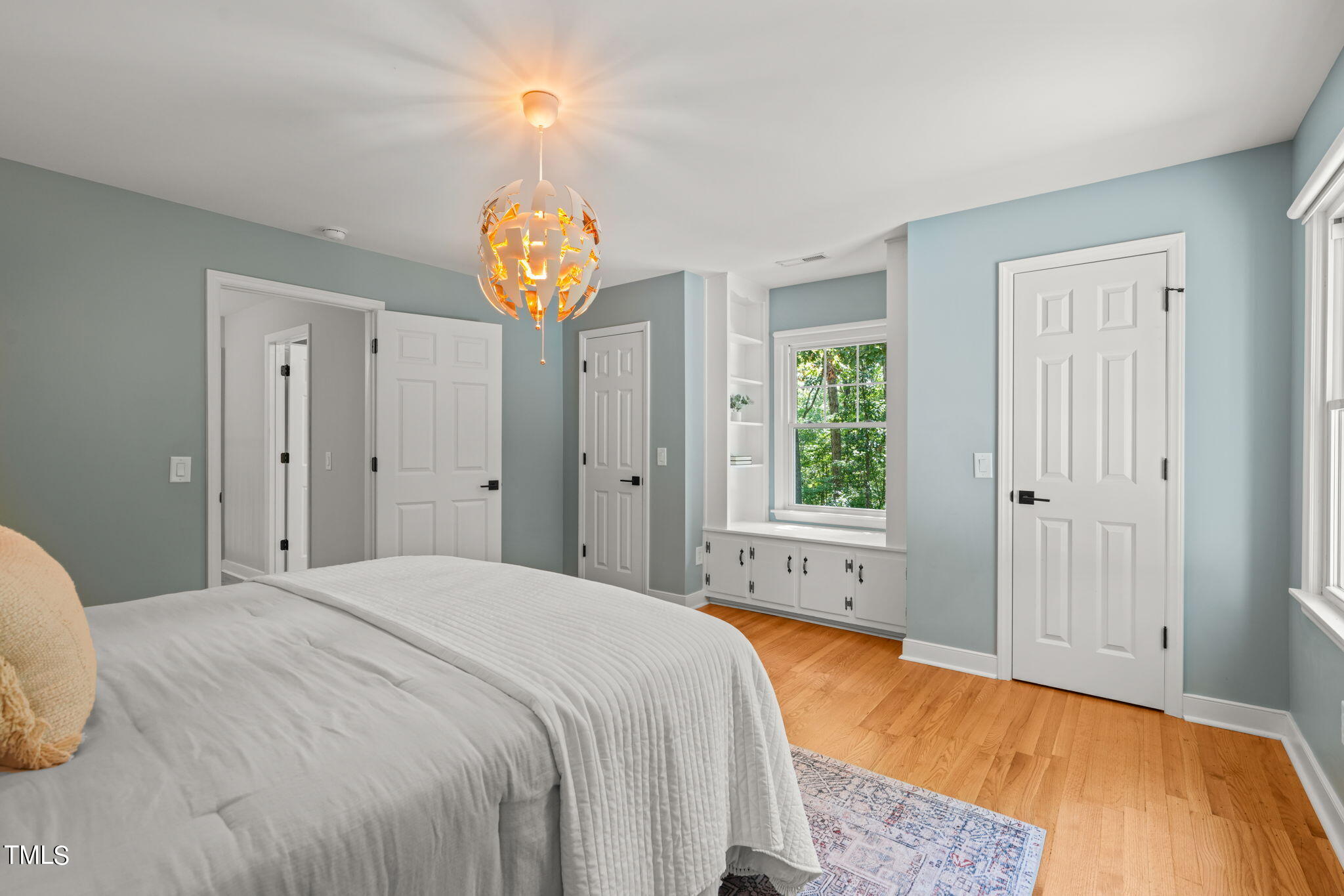 4604 Timberly Drive Durham, NC 27707 - Photo 34 of 60 a spacious bedroom with a bed and a window