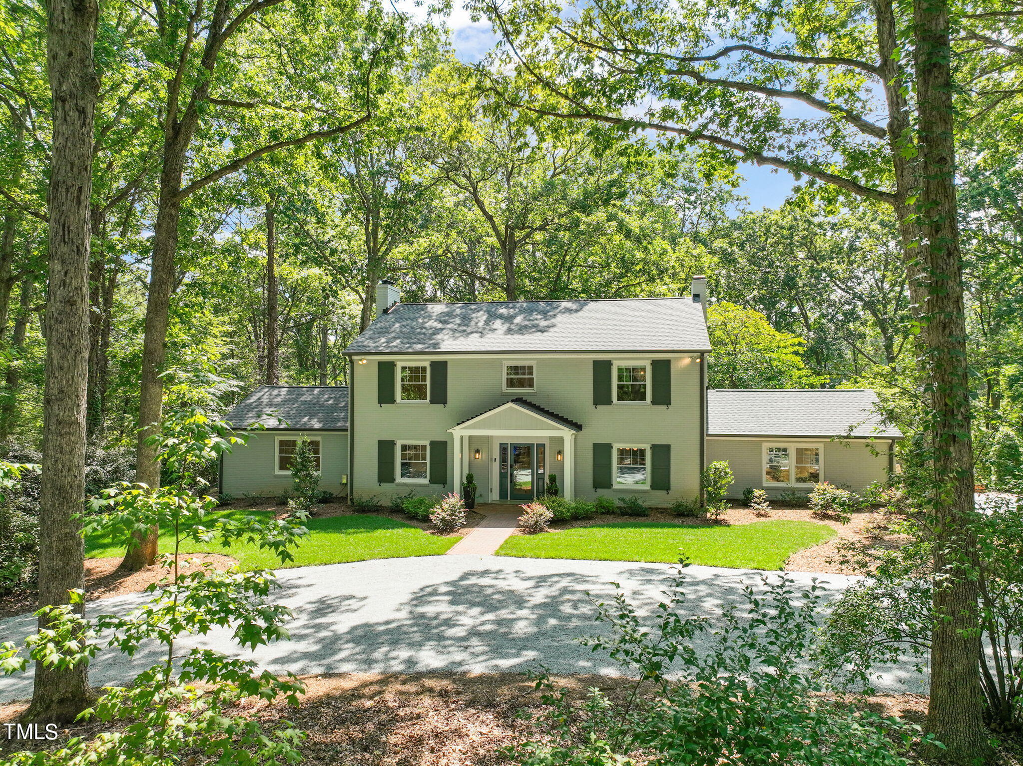 4604 Timberly Drive Durham, NC 27707 - Photo 51 of 60 a view of a house with a big yard and large trees
